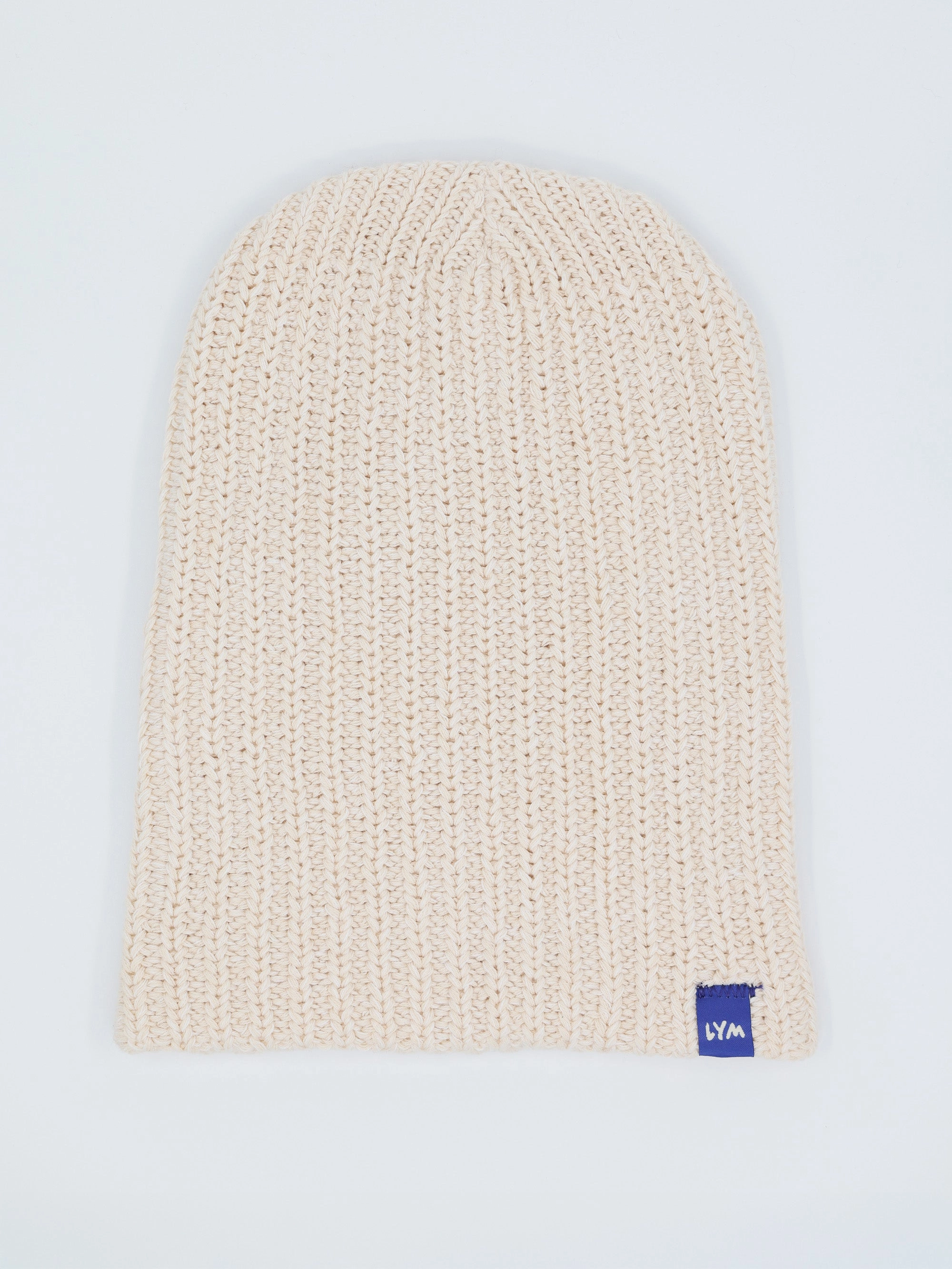 Natural white Essentials beanie, worn long